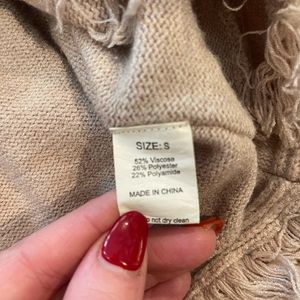 Size small v-neck sweater. Never worn